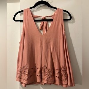 Pink deep vneck tank top with tie in the back and lace detailing